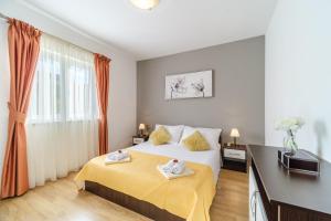 Posteľ alebo postele v izbe v ubytovaní Villa Ankora