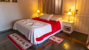 Postel nebo postele na pokoji v ubytování Aardvark Inn Pousada