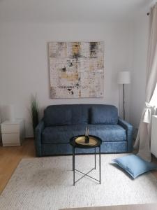 Posezení v ubytování Central Alpha Apartment 7min to the city centar