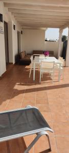 Balkón nebo terasa v ubytování Villa Sunset Faro Deluxe & Spa Pool