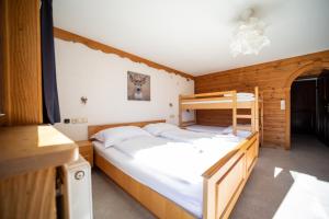 Postel nebo postele na pokoji v ubytování Hotel Wildrose