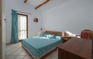 Lova arba lovos apgyvendinimo įstaigoje Sardinia Family Villas - Villa Gaia with private pool in the countryside