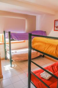 Cama ou camas em um quarto em YAGHAN HOSTEL