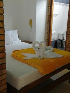 Krevet ili kreveti u jedinici u okviru objekta Hotel Torreon De Rionegro