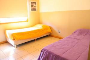 Cama ou camas em um quarto em YAGHAN HOSTEL