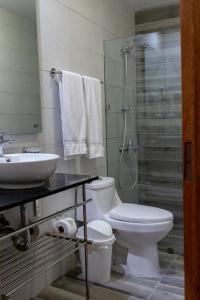 Koupelna v ubytování Hotel Aladino + 16 fotografií