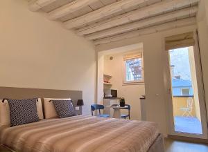 Posteľ alebo postele v izbe v ubytovaní Residenza SubitoSanto - Appartamento 1B "Palladio"