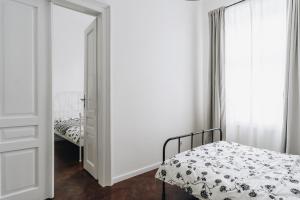 Łóżko lub łóżka w pokoju w obiekcie Podzamcze 24 Apartments