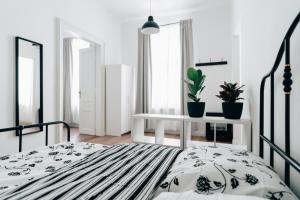 Łóżko lub łóżka w pokoju w obiekcie Podzamcze 24 Apartments