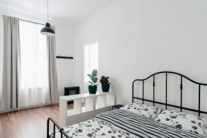 Łóżko lub łóżka w pokoju w obiekcie Podzamcze 24 Apartments