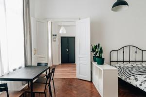 Łóżko lub łóżka w pokoju w obiekcie Podzamcze 24 Apartments