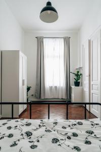 Łóżko lub łóżka w pokoju w obiekcie Podzamcze 24 Apartments
