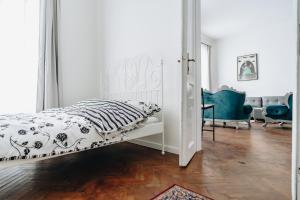 Łóżko lub łóżka w pokoju w obiekcie Podzamcze 24 Apartments