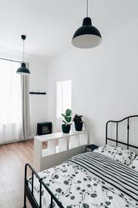 Łóżko lub łóżka w pokoju w obiekcie Podzamcze 24 Apartments