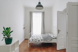 Łóżko lub łóżka w pokoju w obiekcie Podzamcze 24 Apartments