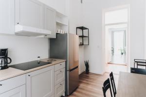 Kuchnia lub aneks kuchenny w obiekcie Podzamcze 24 Apartments
