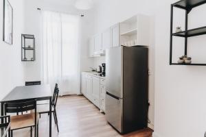 Kuchnia lub aneks kuchenny w obiekcie Podzamcze 24 Apartments
