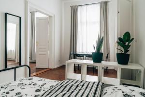 Łóżko lub łóżka w pokoju w obiekcie Podzamcze 24 Apartments