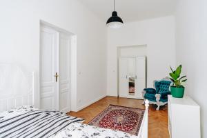 Łóżko lub łóżka w pokoju w obiekcie Podzamcze 24 Apartments