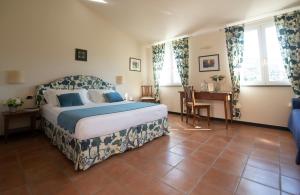 Postel nebo postele na pokoji v ubytování Hotel Al Terra Di Mare