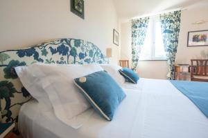 Postel nebo postele na pokoji v ubytování Hotel Al Terra Di Mare
