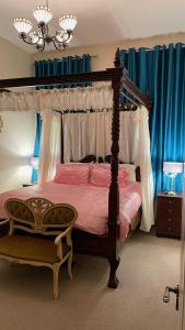 Кровать или кровати в номере Inch Schoolhouse - Event Residence