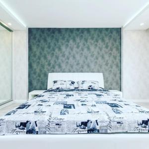 Postel nebo postele na pokoji v ubytování Роскошная 3к квартира 125м2 на набережной . Дрим таун + 11 fotografií