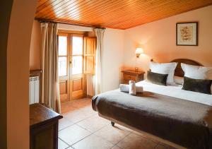 A bed or beds in a room at Can Misse