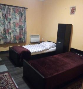 Postel nebo postele na pokoji v ubytování Motelik Lukitas