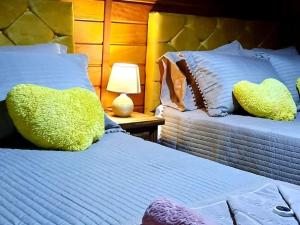 Ліжко або ліжка в номері SPA Rossett em Itapoá - Luxo e conforto c piscina, hidromassagem e cromoterapia, p 22 pessoas!