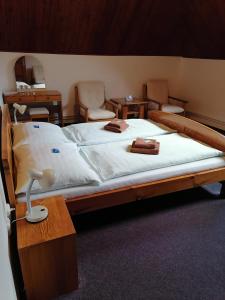 Postel nebo postele na pokoji v ubytování Penzion Stella