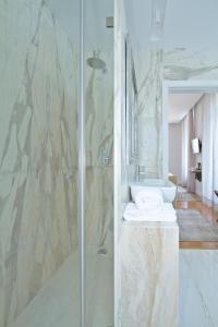 a bathroom with a shower with a toilet and a sink at Villa Bela Vista in Sintra +35 photos