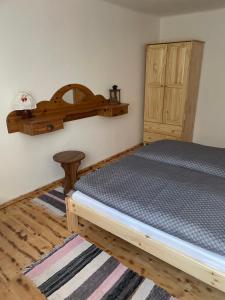 Postel nebo postele na pokoji v ubytování Chata Studnička Šumiac