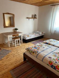 Postel nebo postele na pokoji v ubytování Chata Studnička Šumiac