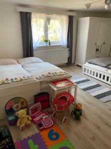Postel nebo postele na pokoji v ubytování Chata Studnička Šumiac