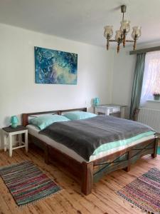 Postel nebo postele na pokoji v ubytování Chata Studnička Šumiac
