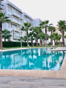 Foto dalla galleria di Apparemment de luxe vue piscine a Bouznika