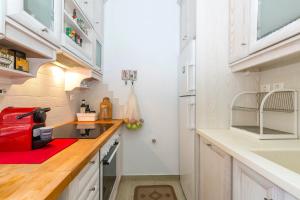 A kitchen or kitchenette at Ampio Cantone Suite