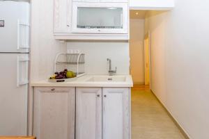 A kitchen or kitchenette at Ampio Cantone Suite