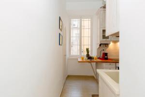 A kitchen or kitchenette at Ampio Cantone Suite
