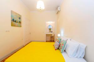 A bed or beds in a room at Ampio Cantone Suite