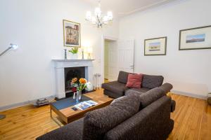 A seating area at Ampio Cantone Suite