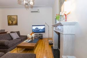 A television and/or entertainment centre at Ampio Cantone Suite