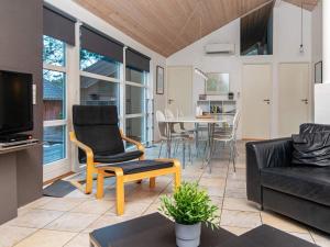 A seating area at 8 person holiday home in Ebeltoft