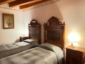 Giường trong phòng chung tại Agriturismo Clochiatti