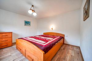 Postel nebo postele na pokoji v ubytování AA Chalupa Šumava