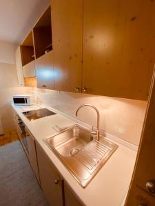 Η κουζίνα ή μικρή κουζίνα στο Appartamenti Pichler +103 φωτογραφίες