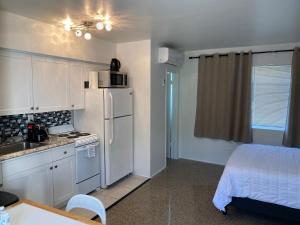 Kuchyň nebo kuchyňský kout v ubytování Tiana Beach Inn