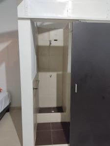 Ένα μπάνιο στο Olimpia Habitaciones Departamentos