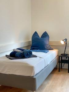 Postel nebo postele na pokoji v ubytování Hegau Boardinghouse